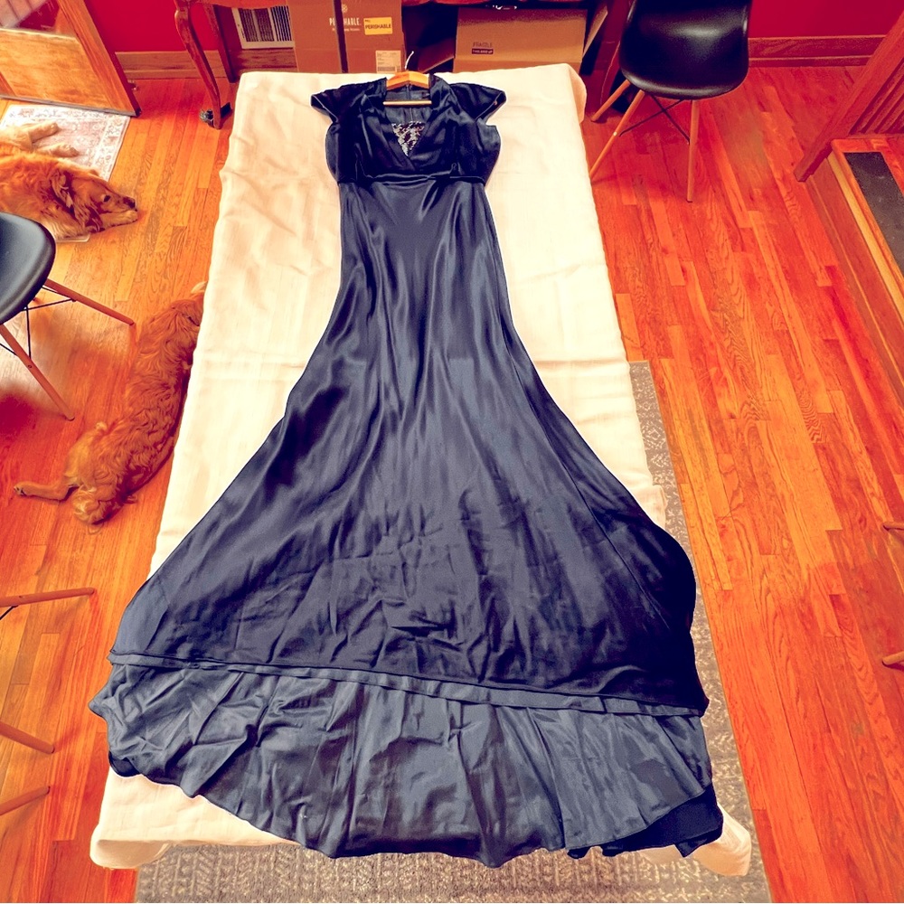 Navy blue, satin, ball gown. Long train. Runs large.